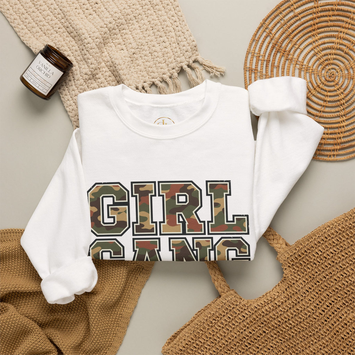Girl Gang Camo Lettering Sweatshirt, white, styled flat lay with blanket and candle