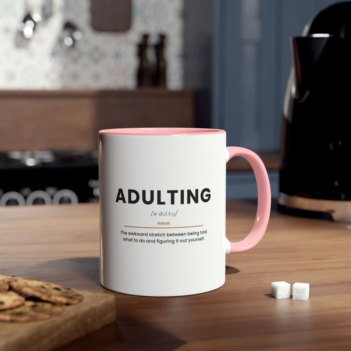Adulting Definition Coffee Mug, Pink, lifestyle photo on kitchen counter