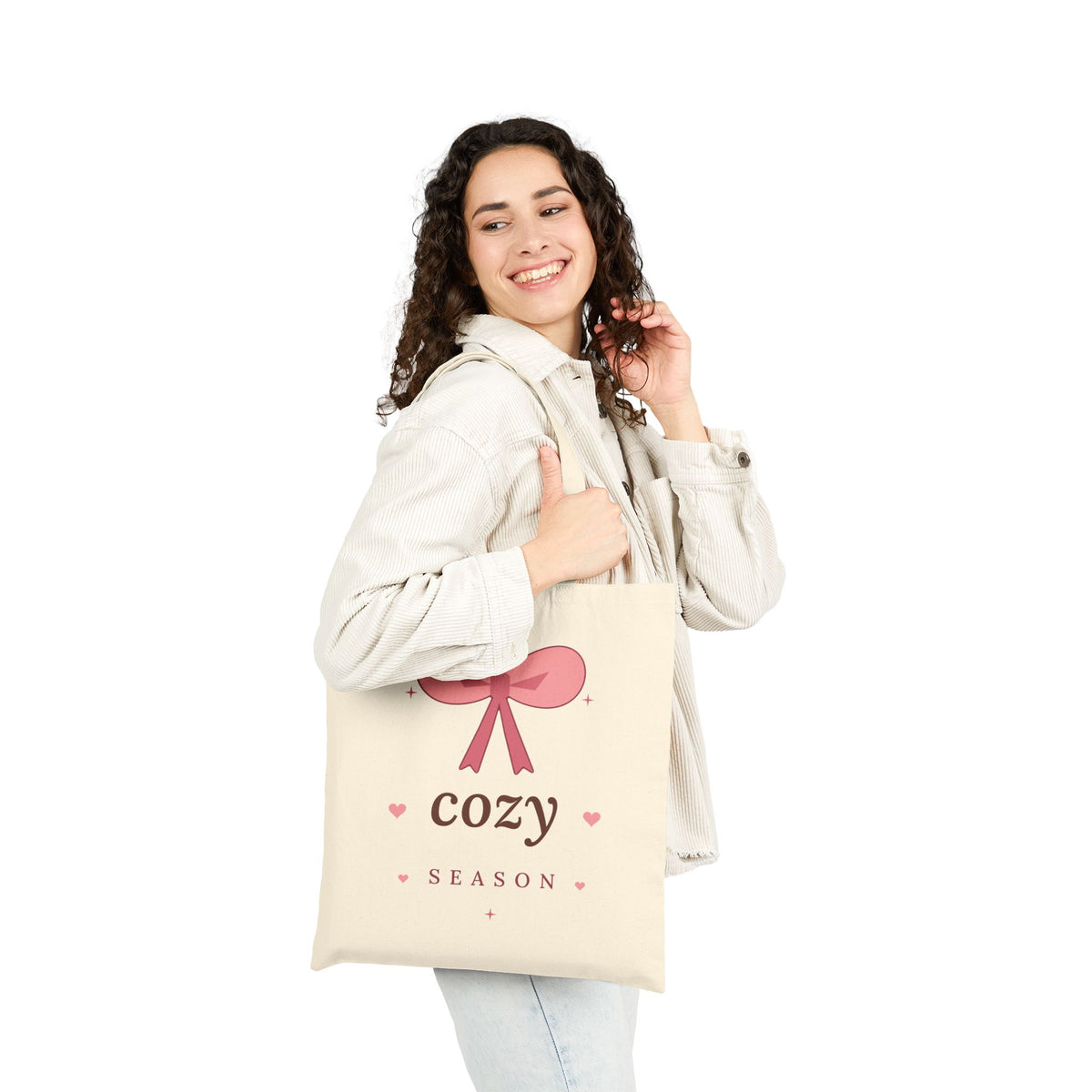 Cozy Season Canvas Tote Bag, natural, lifestyle photo carried over the shoulder
